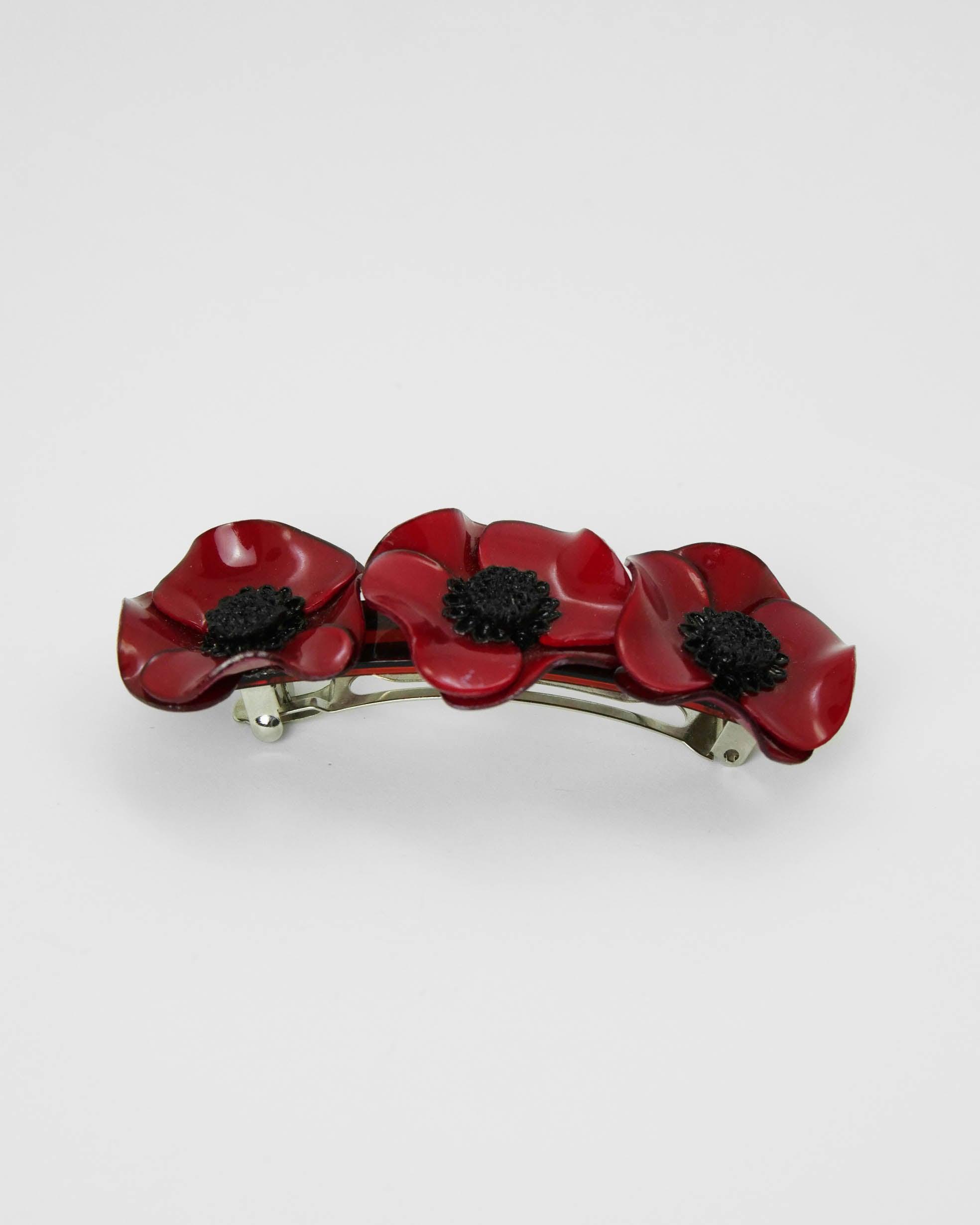 Barrette de cheveux clips avec trois fleurs rouges