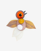 broche accessoire en forme de colibri coloré couleur ivoire