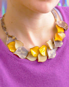 all-groups collier zora jaune et motif léopard