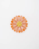 broche daisy en forme de marguerite colorée en corail