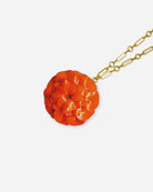 Grand pendentif orange avec chaine dorée 