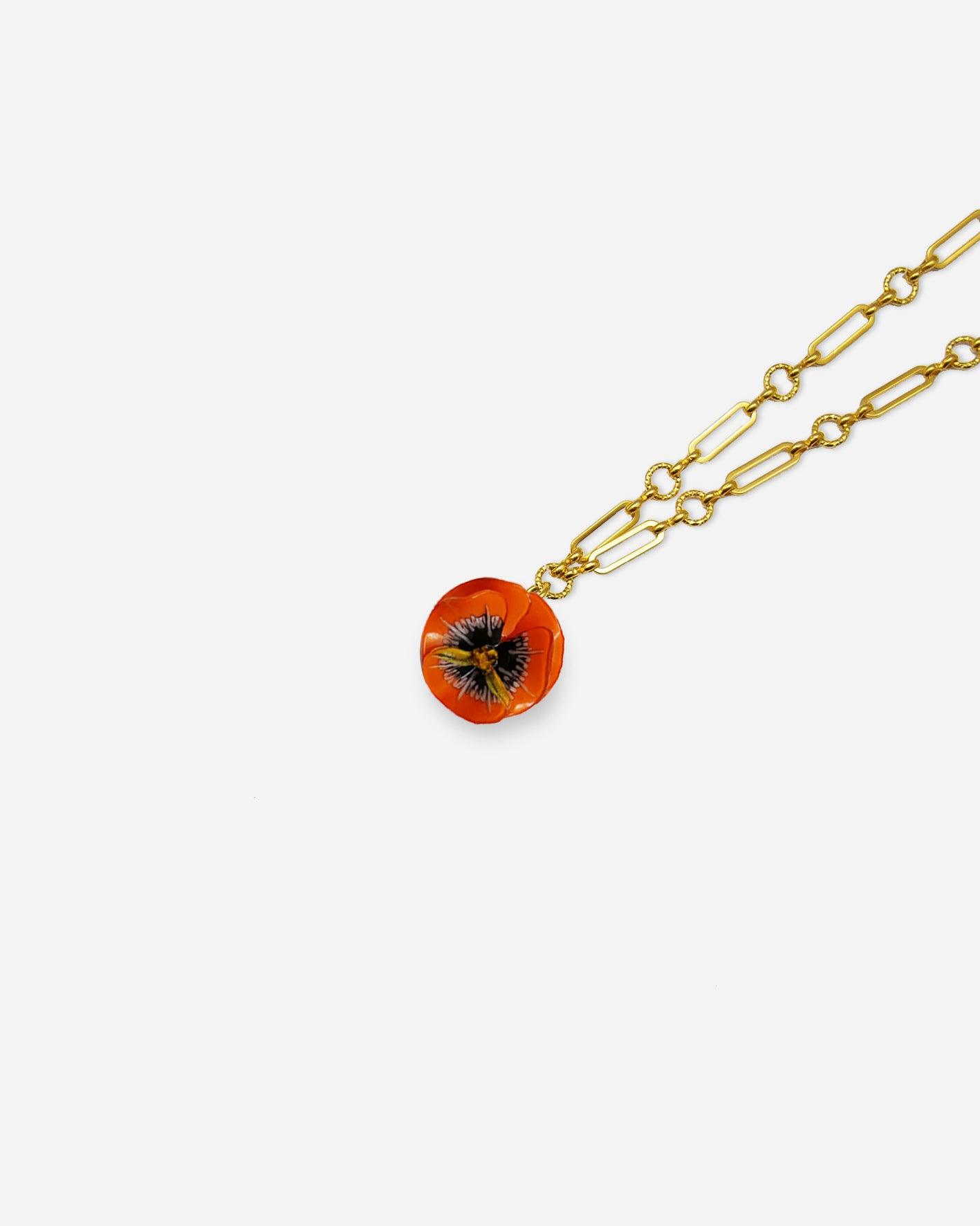 Pendentif fleur orange avec chaine plaquée or